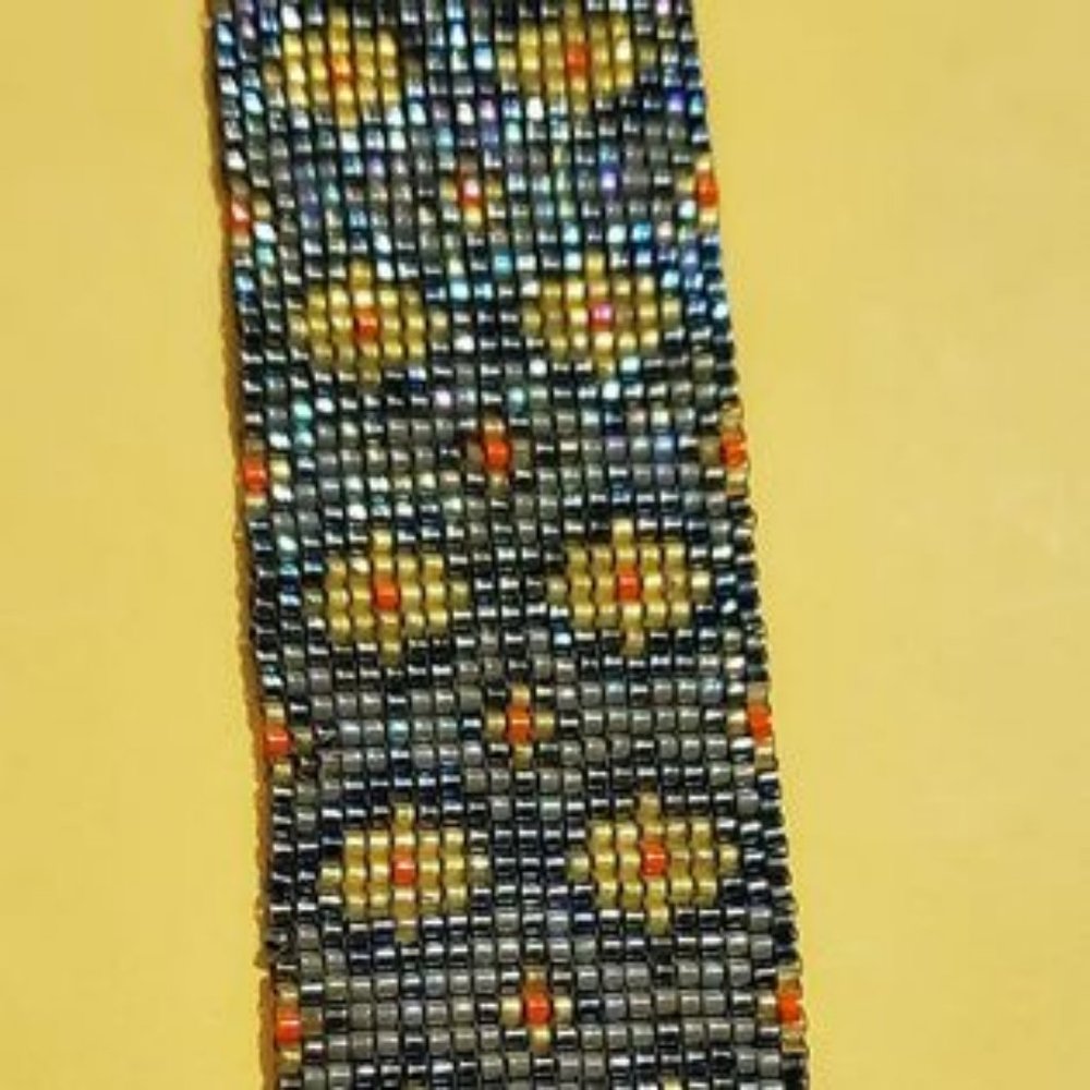 Hand beaded bracelet. multi color